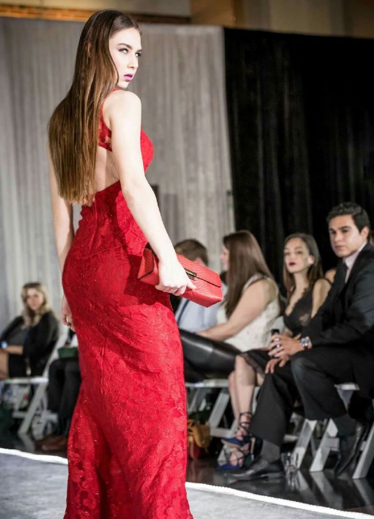 Rainn Fashion show model with Red Python Clutch